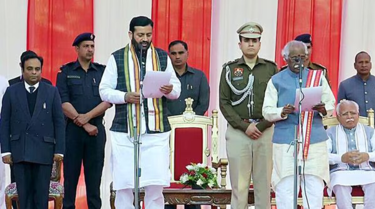 Nayab Singh Saini takes the oath of office as chief minister of Haryana.